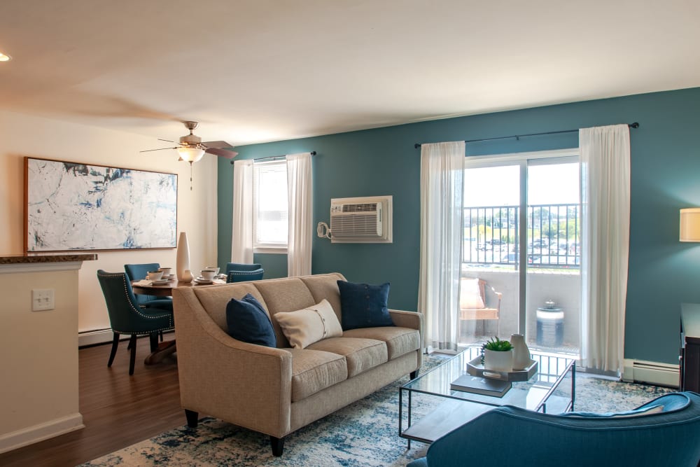 Living Room at Hill Brook Place Apartments in Bensalem, Pennsylvania