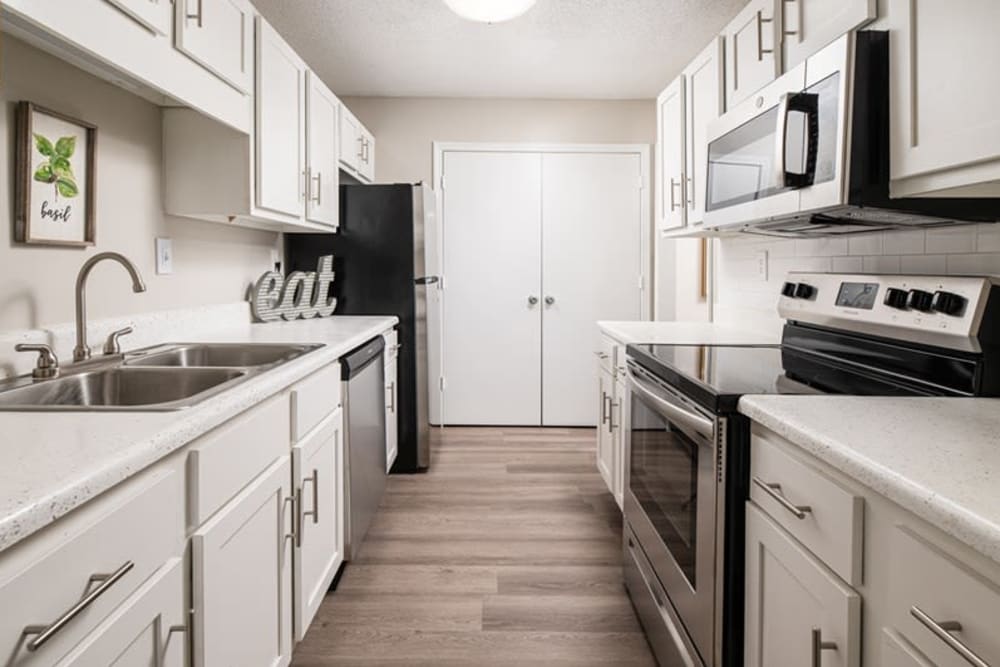 apartment kitchen with stainless steel appliances at Indigo at 61 in Robinsonville, Mississippi