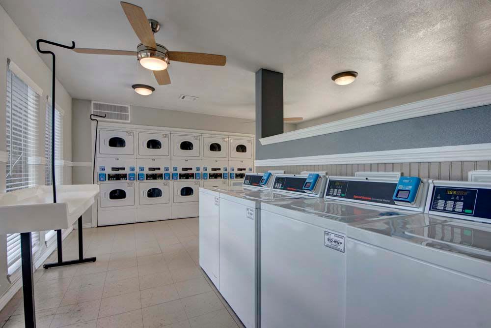 Spacious and well-maintained laundry area at The Fairway Apartments in Plano, Texas