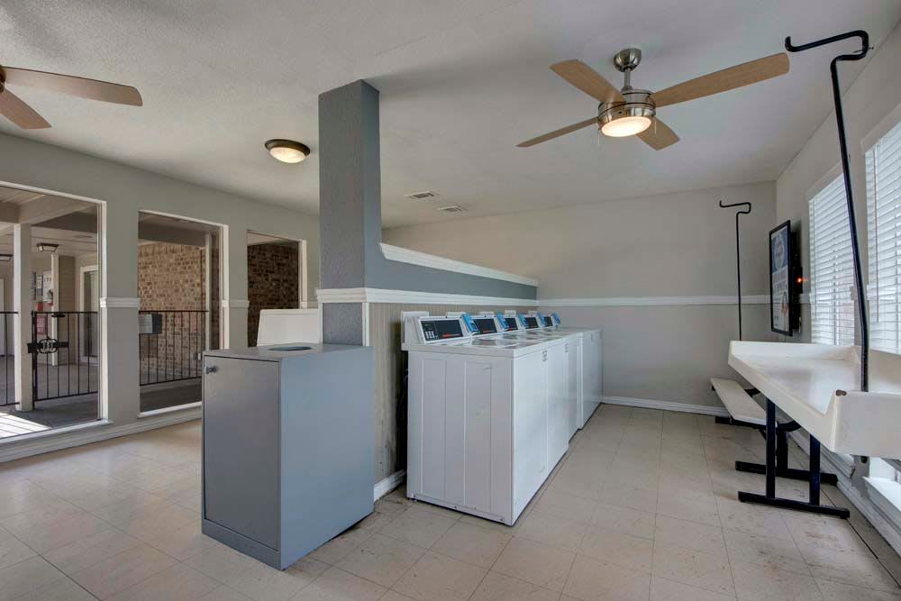 Generous laundry area at The Fairway Apartments in Plano, Texas