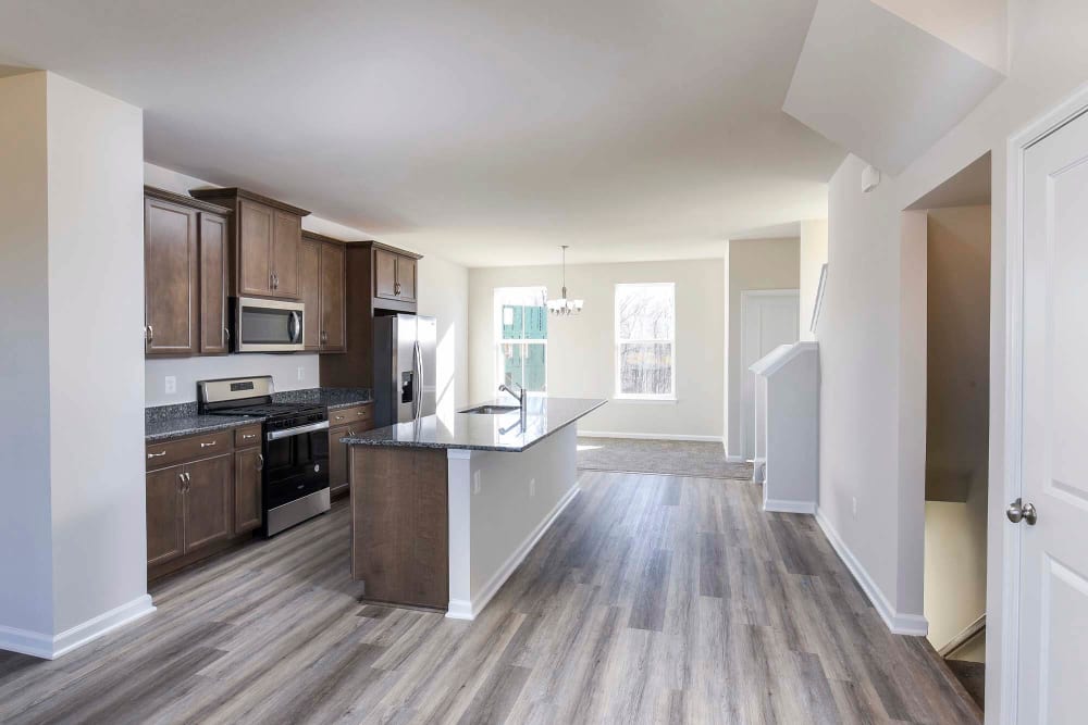 Kitchen with wood flooring at The Collection at Scotland Heights in Waldorf, Maryland