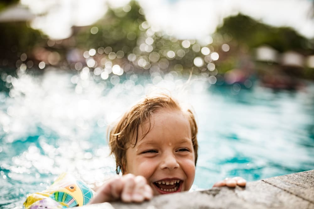 Child swimming in the pool at Olympus at Jack Britt in Fayetteville, North Carolina