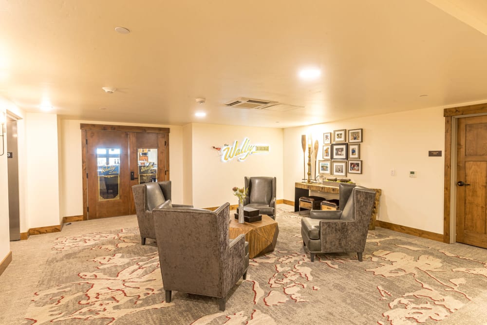 Lounge area with seating around a coffee table at Touchmark at Pilot Butte in Bend, Oregon