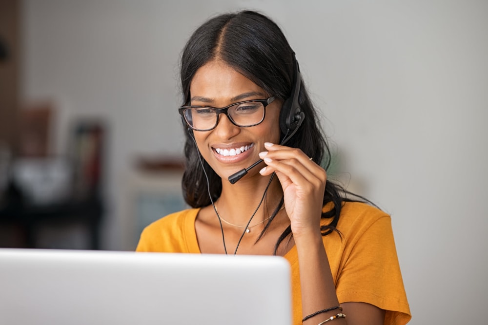 A smiling customer service agent at Storage Star Laramie in Laramie, Wyoming