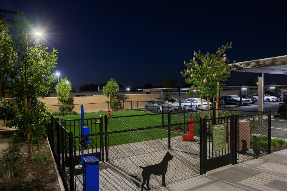 The fenced entrance to the on-site dog park at Alivia Townhomes in Whittier, California