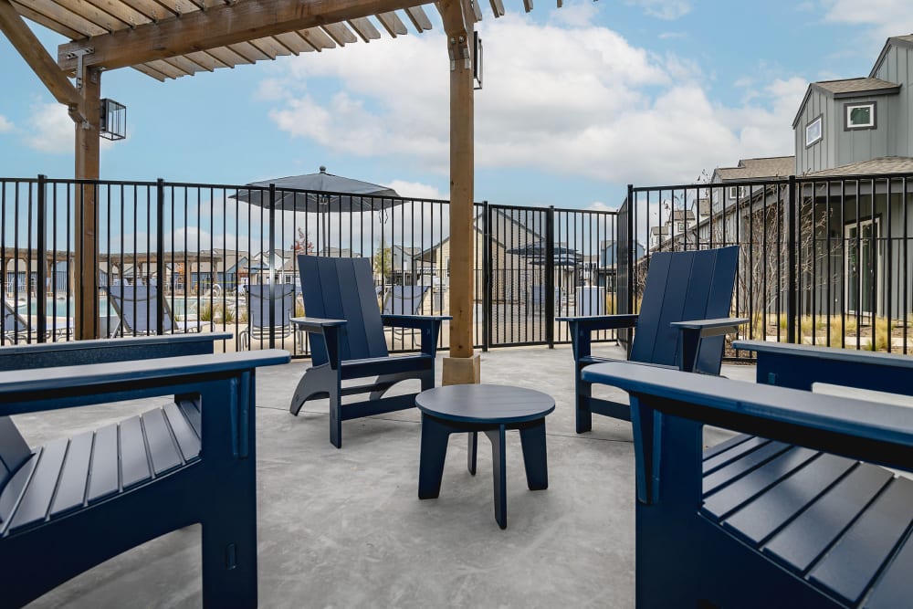 Outdoor lounge area new pool at parcHAUS AT CELINA PARKWAY in Celina, Texas