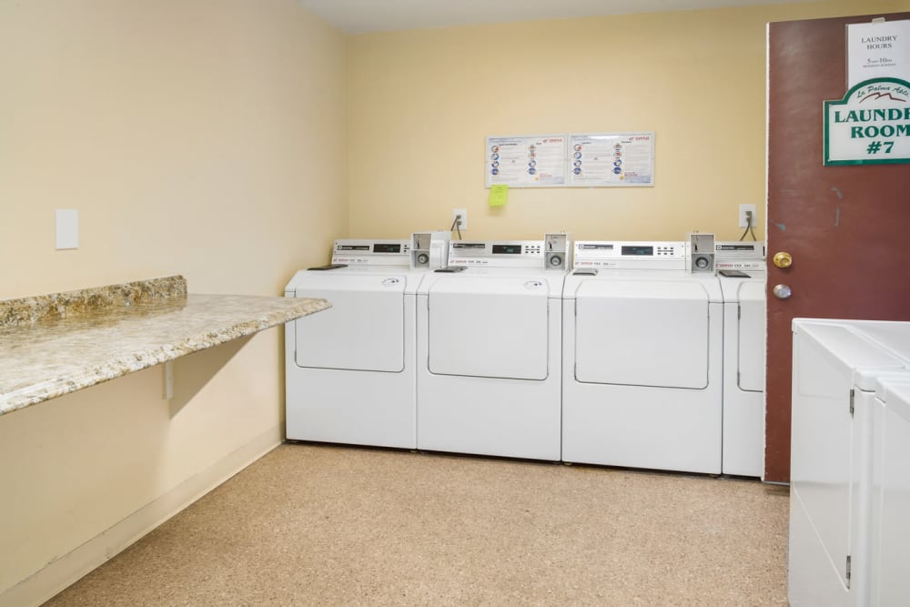 Laundry facility at Casa La Palma Apartment Homes in La Palma, California