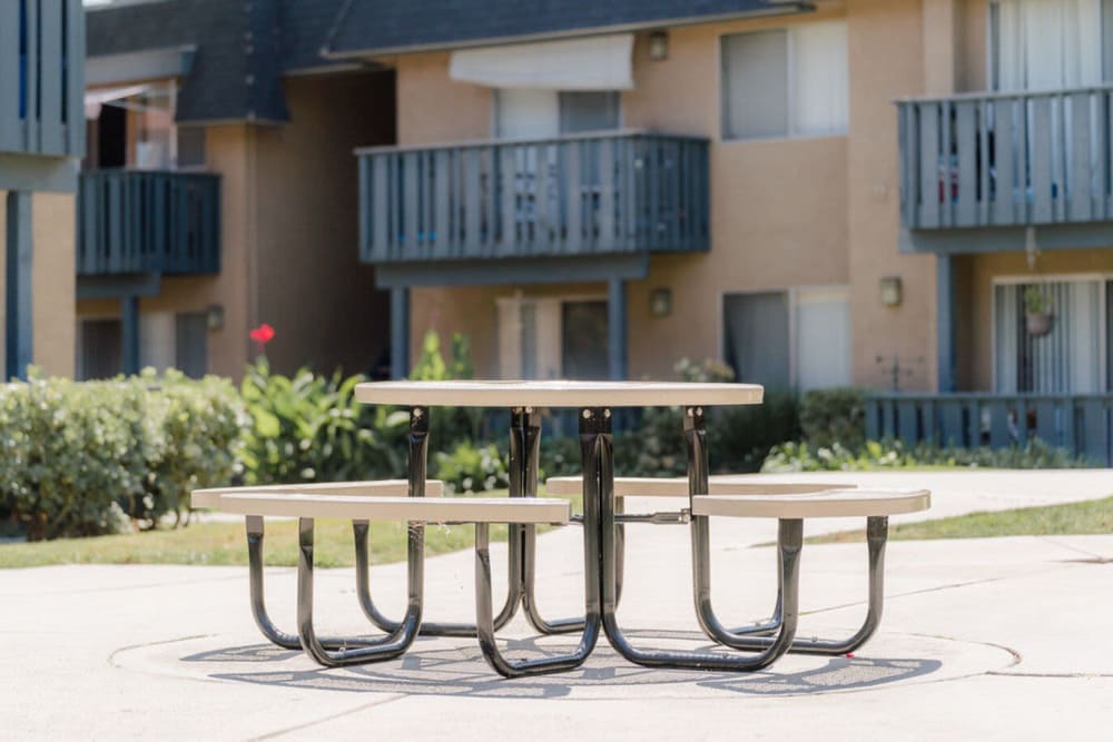 Outdoor seating at Casa La Palma Apartment Homes in La Palma, California