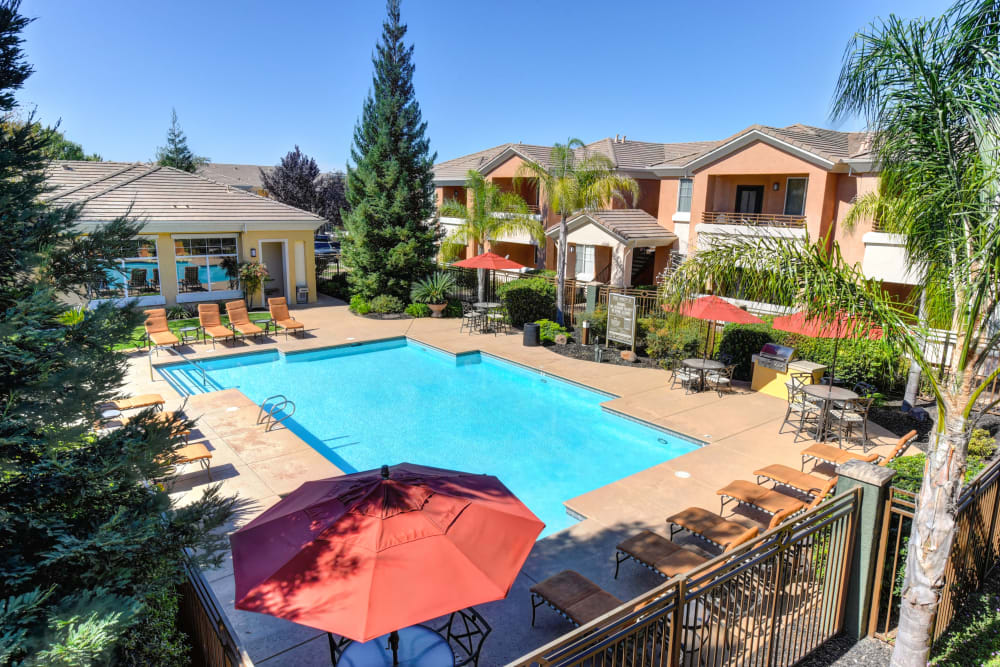 swimming pool and lounge chairs at Broadstone at Stanford Ranch in Rocklin, California