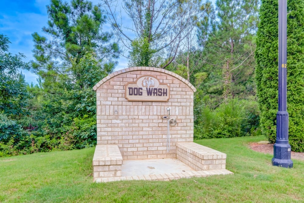 Outdoor dog wash station at Estates at McDonough Apartment Homes in McDonough, Georgia
