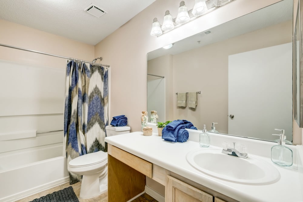 Large well lit bathrooms at our apartment located at Keswick Village Apartments & Townhomes in Conyers, Georgia