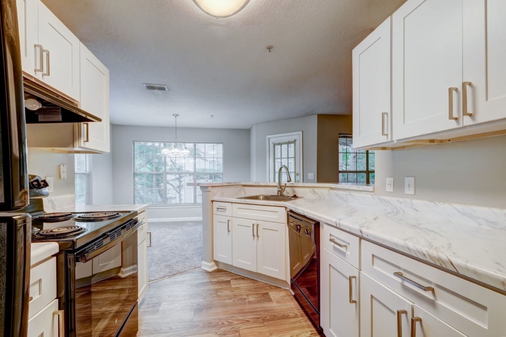 Beautiful modern kitchen with utilities included Keswick Village Apartments & Townhomes in Conyers, Georgia