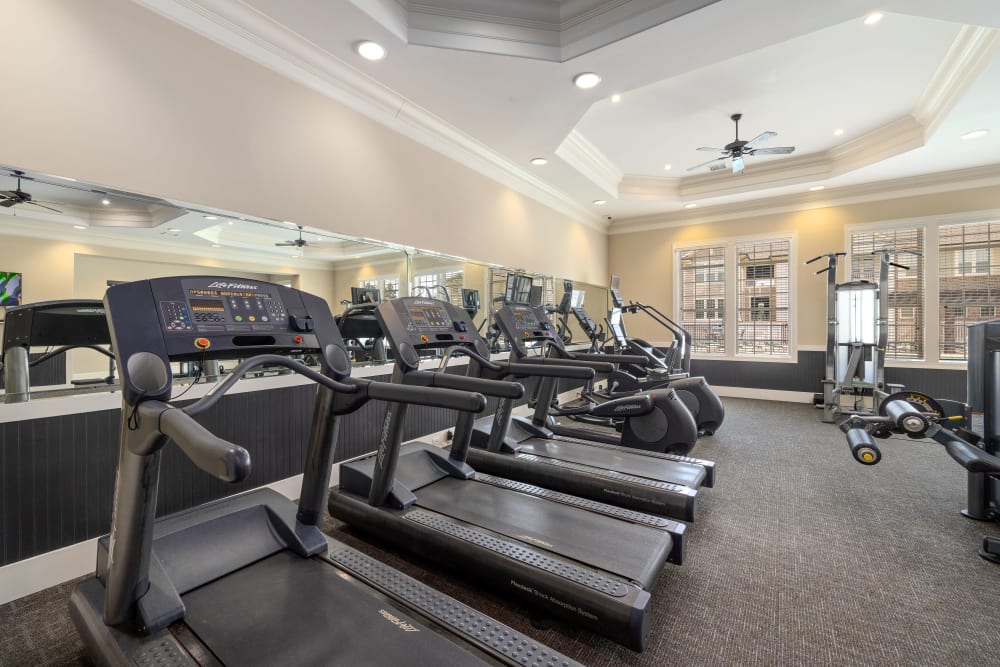 Fitness center with cardio equipment at Marquis Ellis Crossing in Durham, North Carolina