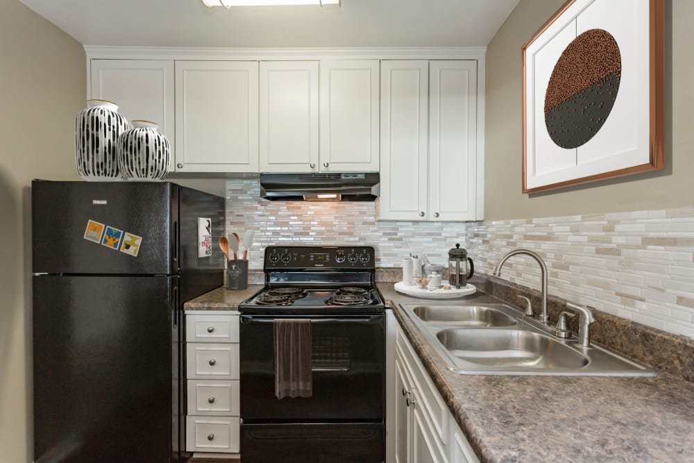 Kitchen with great lighting at Belmont Place Apartments in Nashville, Tennessee