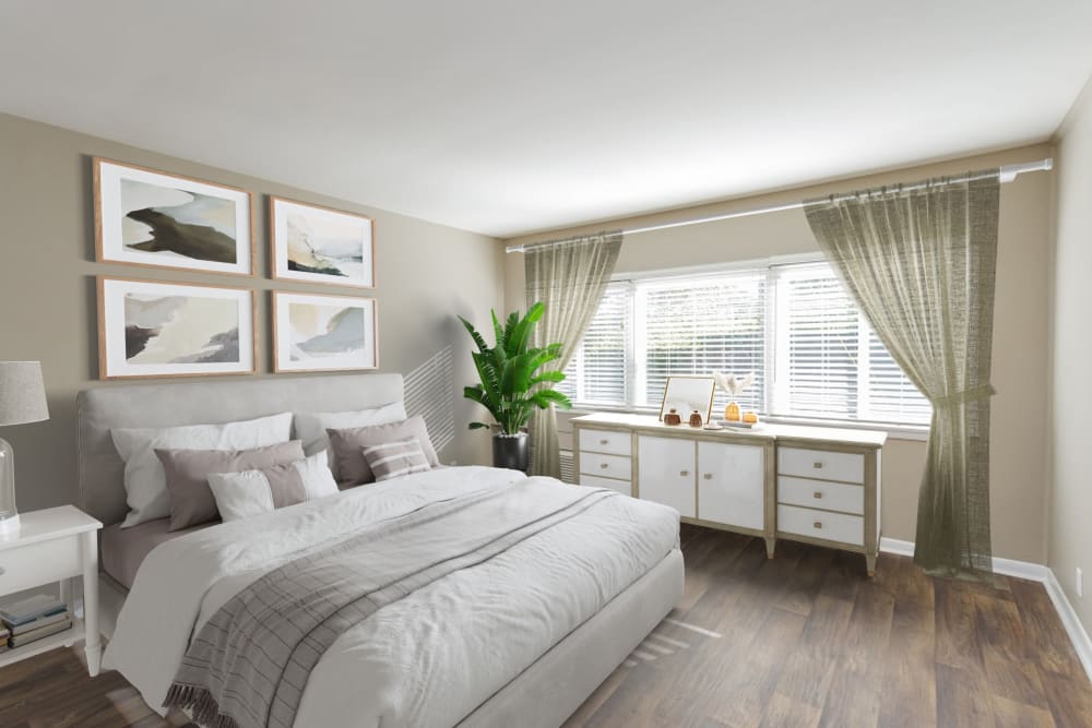 Bedroom with plush carpeting at Belmont Place Apartments in Nashville, Tennessee