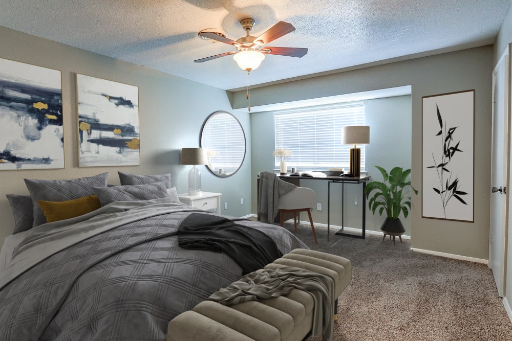 Bedroom with ceiling fan at Country Oaks Apartments in Hixson, Tennessee