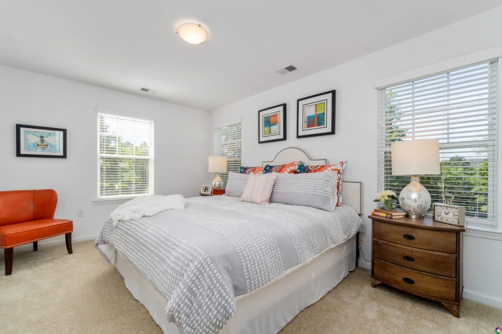 Bedroom with plenty of room and natural light at Dragas Home Rentals in Virginia Beach, Virginia