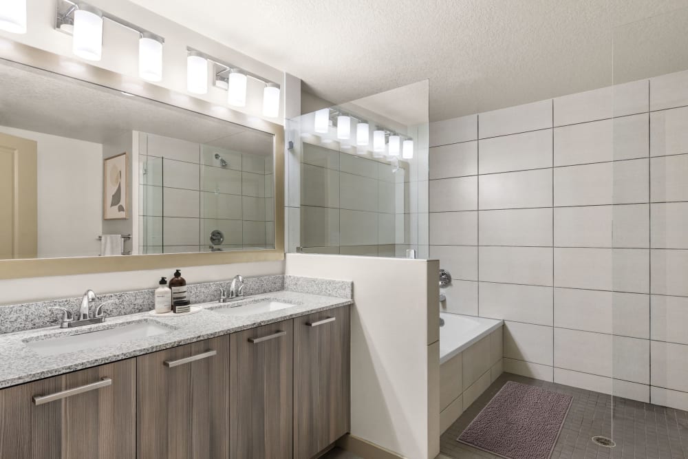 A bathroom with a tub at Eterno in Pompano Beach, Florida