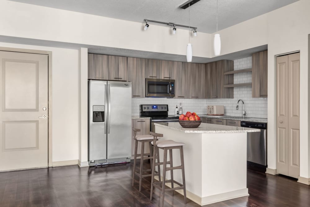 Kitchen with an island at Eterno in Pompano Beach, Florida