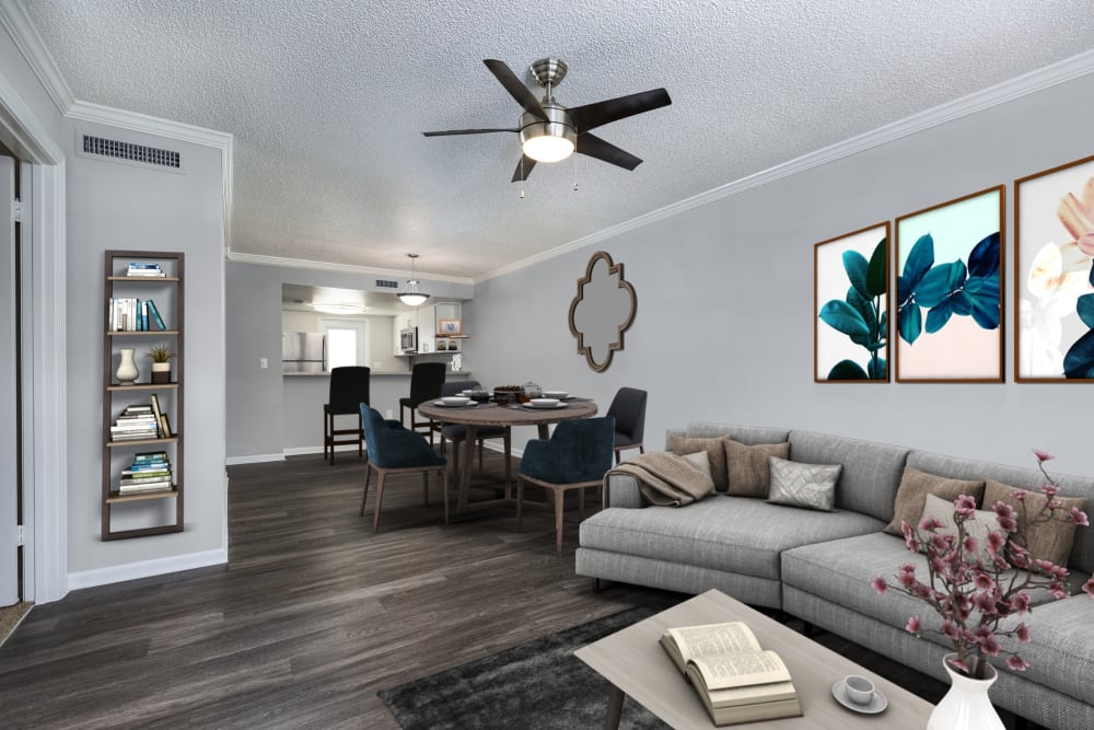 Furnished living room and dining area with ceiling fan at Barrington Place at Winter Haven in Winter Haven, Florida