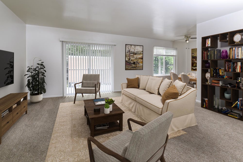 model carpeted living room with couches and a tv at Westover Pointe in Wilmington, Delaware