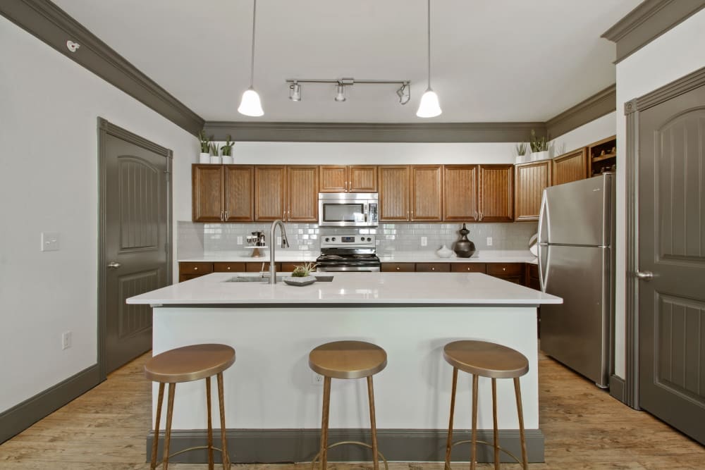 Model kitchen with counter seating at Marquis on Evans in San Antonio, Texas