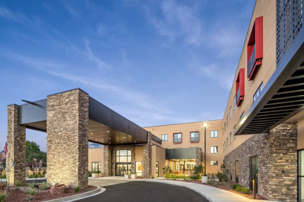 Drive up entrance with stone accents at Amaran Senior Living in Albuquerque, New Mexico