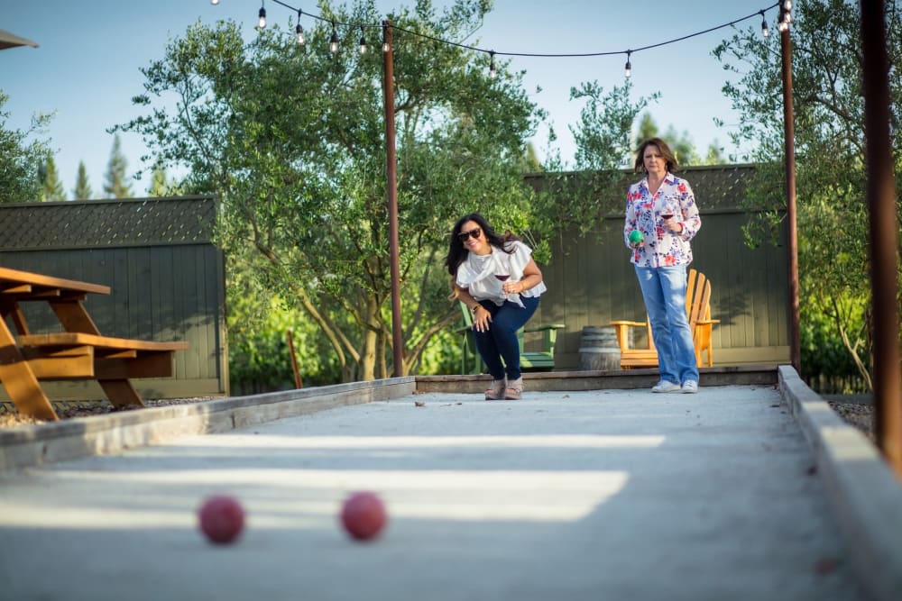 Residents playing bocce ball at  The Everstead at Windrose in Spring, Texas