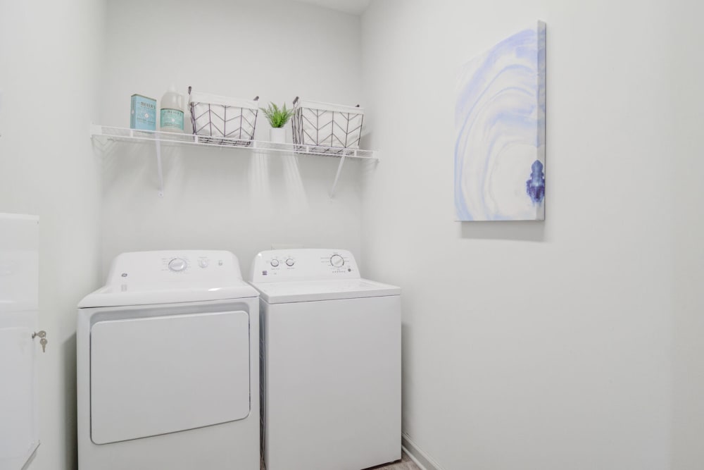 A full sized washer and dryer in an apartment at Bradley Park Apartments in Cumming, Georgia