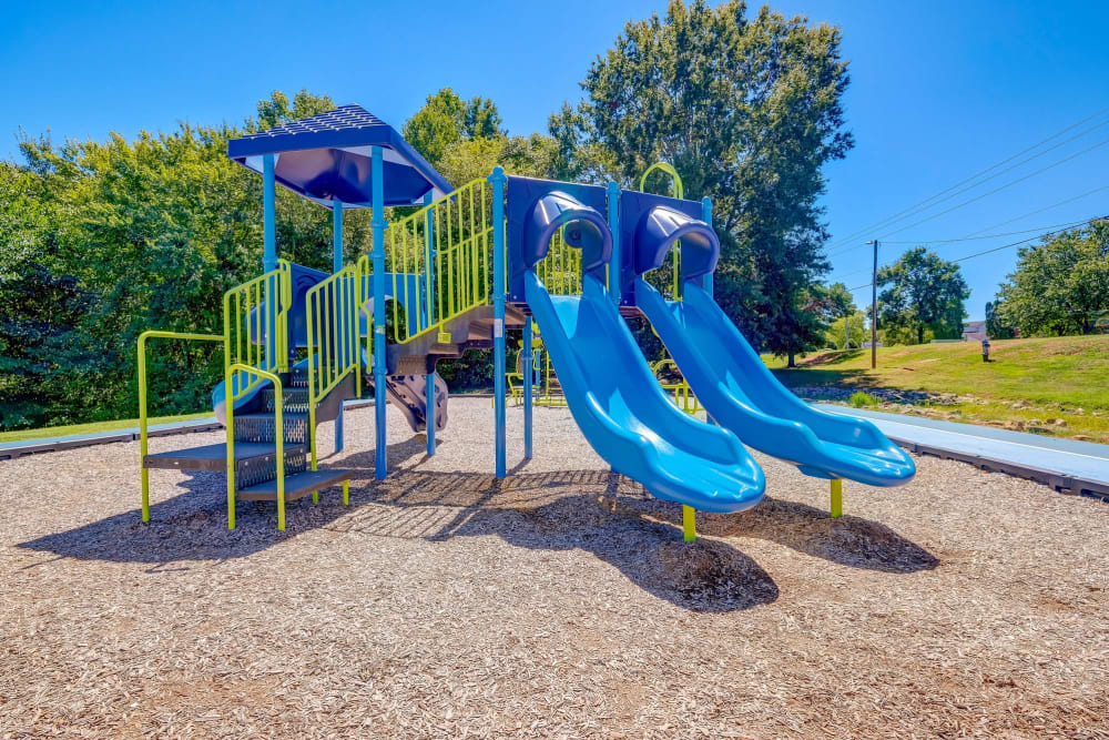 Apartments with a Playground equipped with a slide located at Lakewood Apartment Homes in Salisbury, North CarolinaClub