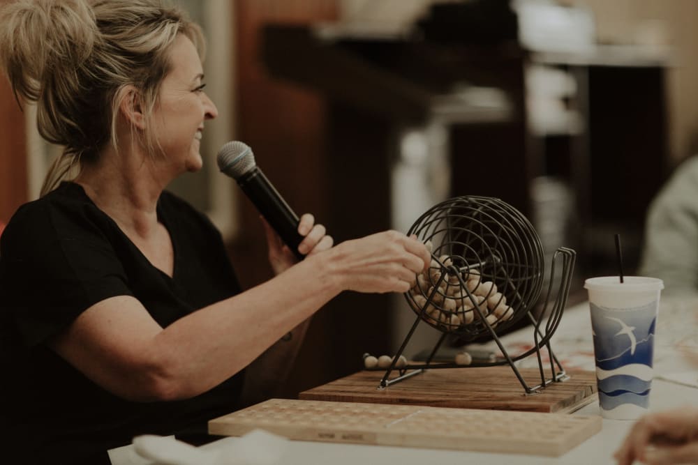 Person calling bingo at The Whitcomb Senior Living Tower in St. Joseph, Michigan