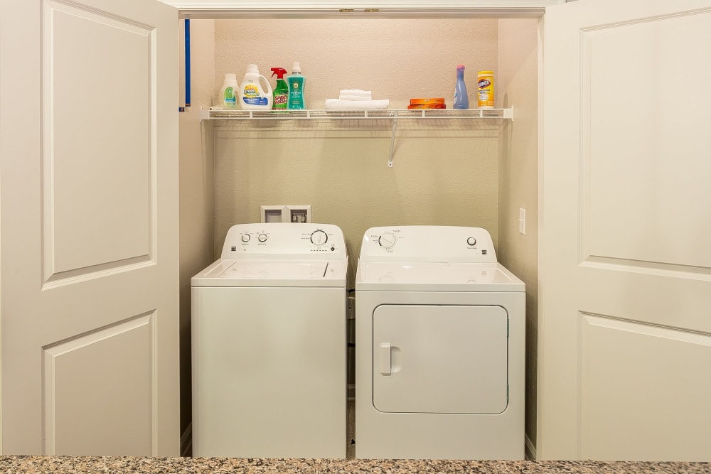 Side by side washer and dryer in a closet
