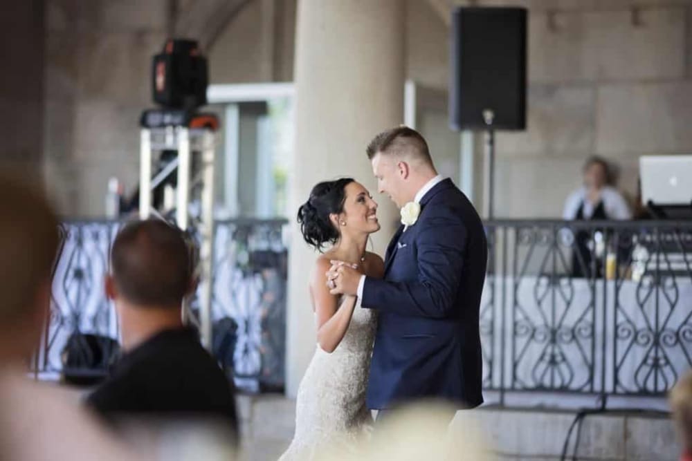 Couple dancing together at their wedding at The Whitcomb Senior Living Tower in St. Joseph, Michigan