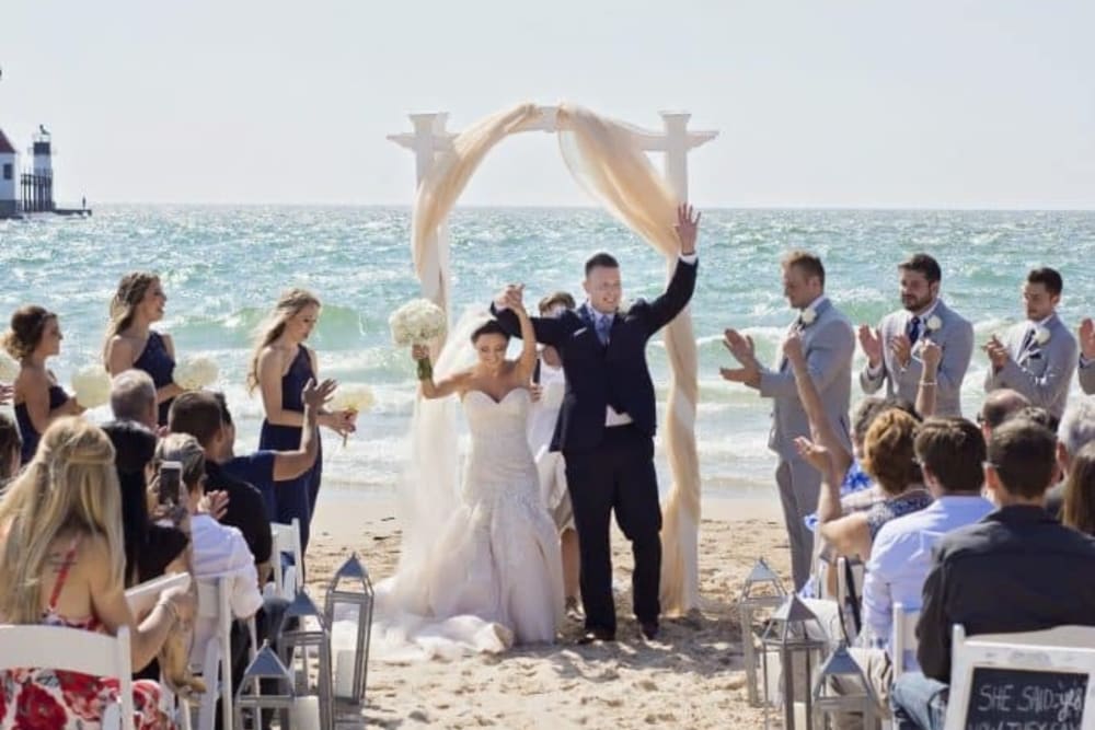 Couple at their wedding ceremony at The Whitcomb Senior Living Tower in St. Joseph, Michigan