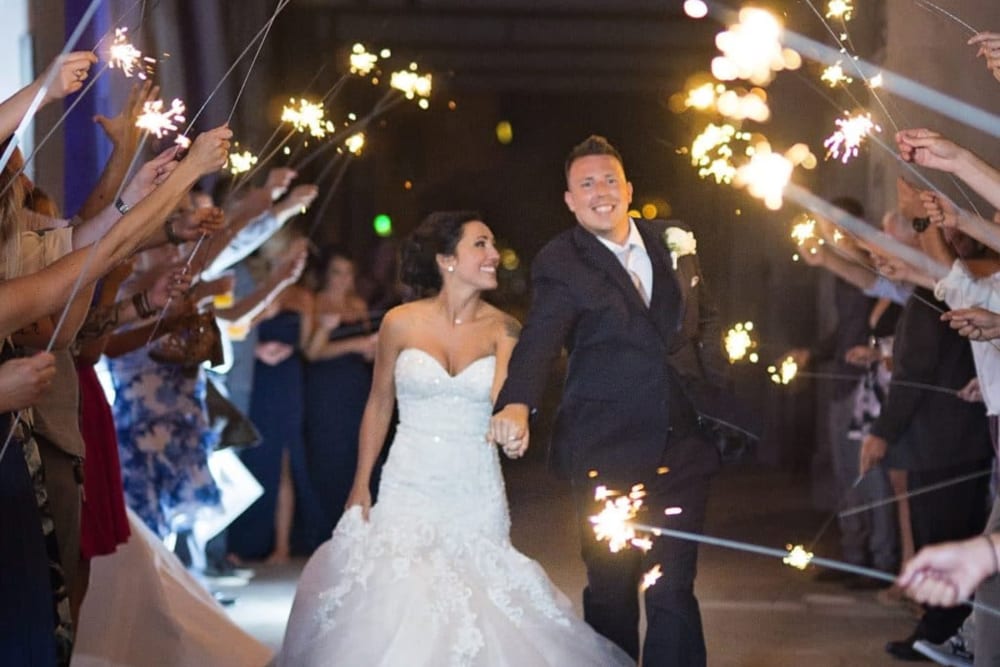 Couple celebrating their wedding at The Whitcomb Senior Living Tower in St. Joseph, Michigan