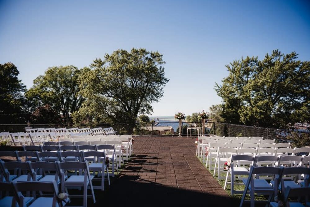 Wedding ceremony outdoors at The Whitcomb Senior Living Tower in St. Joseph, Michigan