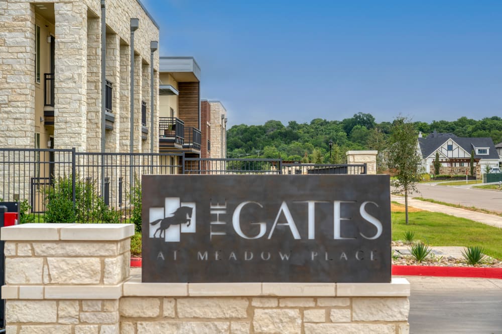 Apartments with a Sign at The Gates at Meadow Place in Willow Park, Texas