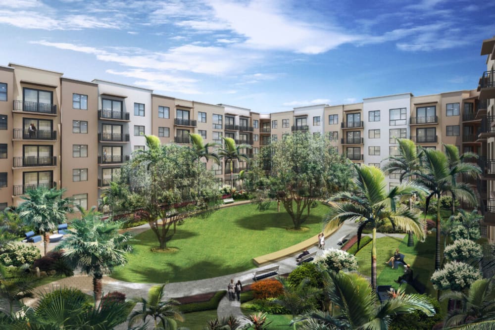 Exterior of apartments and courtyard at Shalimar at Plantation in Plantation, Florida