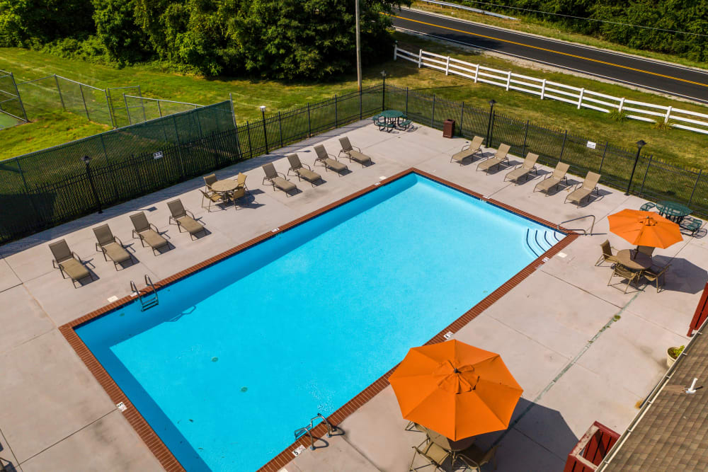 Outdoor swimming pool with chairs at Iron Ridge, Elkton, Maryland