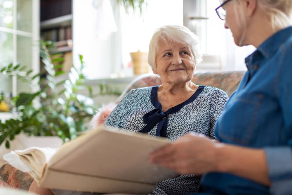 Nurse taliking with lady at Vista Prairie at Copperleaf in Willmar, Minnesota