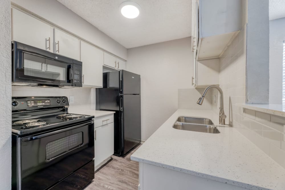 Clean kitchen at Marshall Apartment Homes in Balch Springs, Texas