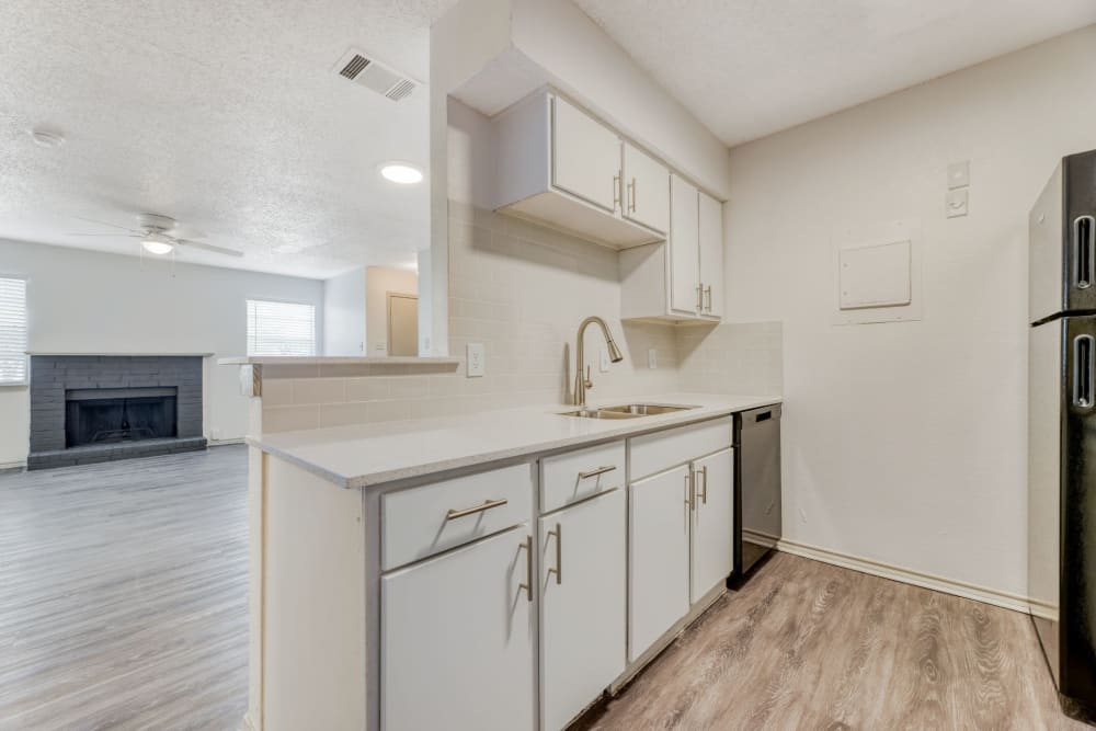 Spacious kitchen and living spaces at Marshall Apartment Homes in Balch Springs, Texas