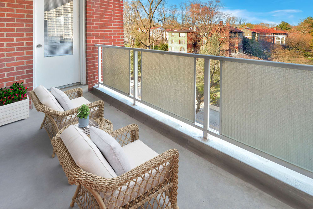 A furnished balcony in a home at The Carlyle Apartments in Baltimore, Maryland