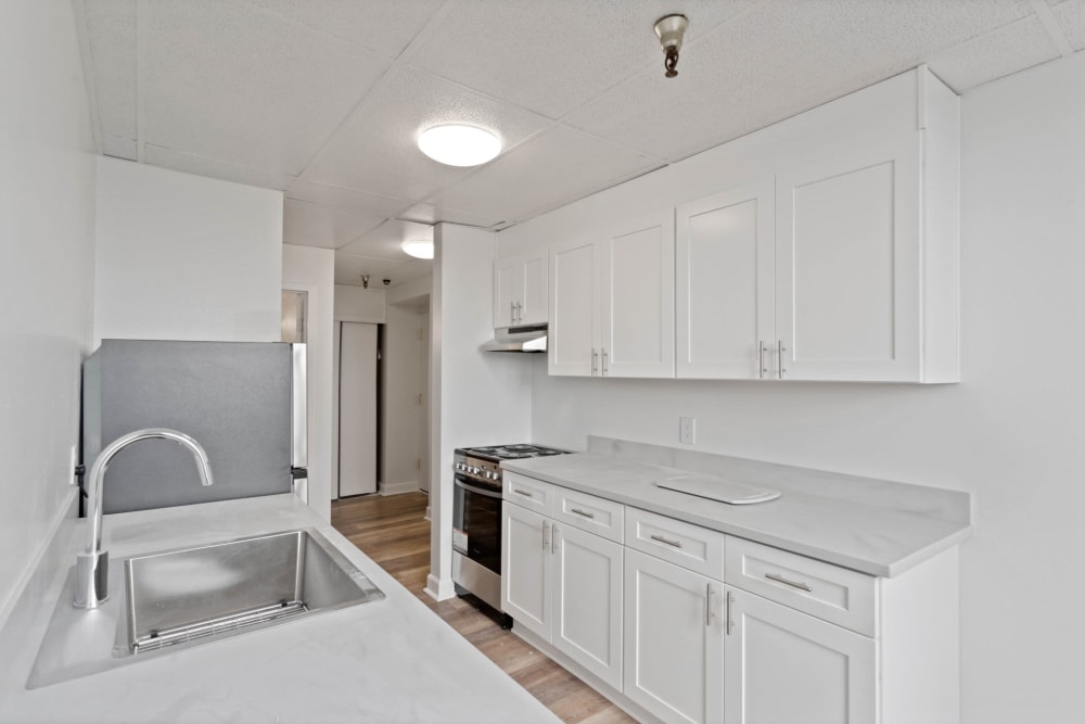 Updated kitchens feature new cabinets and appliances at Coeur D'Alene Plaza in Spokane, Washington