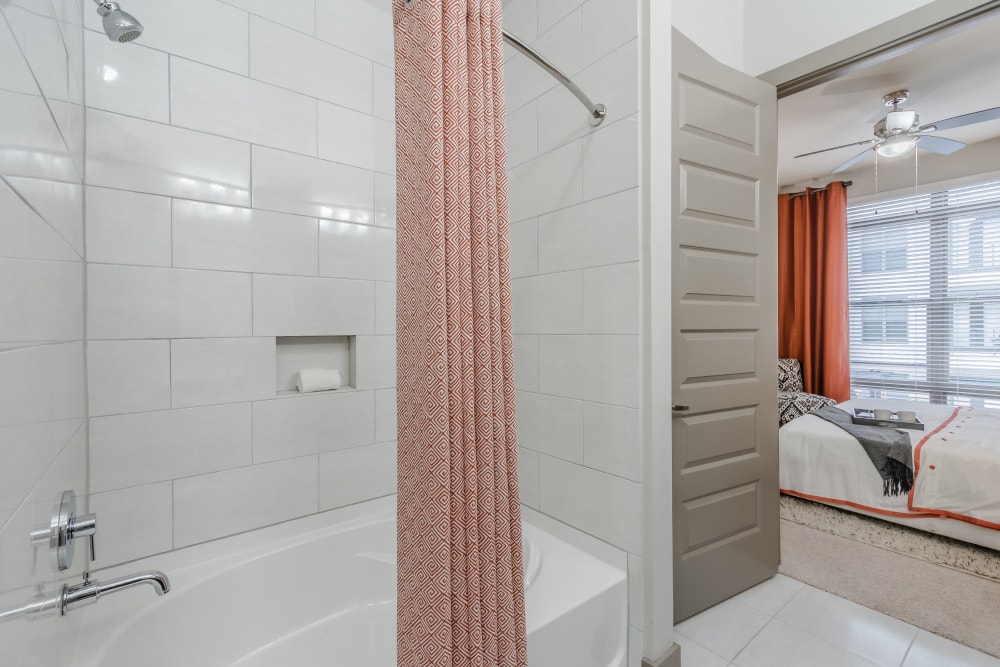 Bathroom with bathtub at Apartments in Richardson, Texas