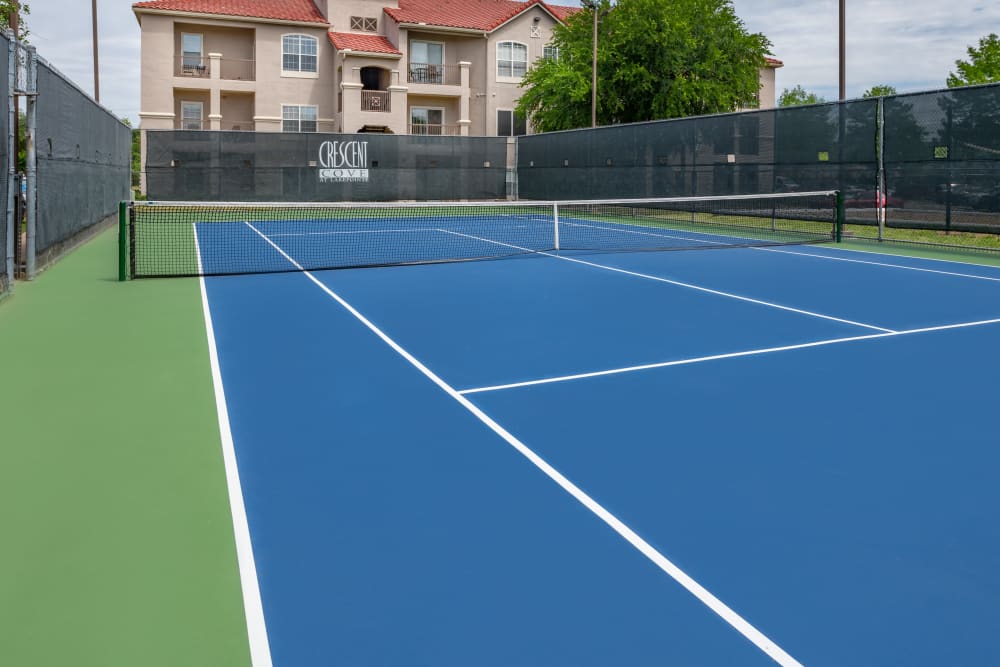 Lighted tennis court at Crescent Cove at Lakepointe in Lewisville, Texas