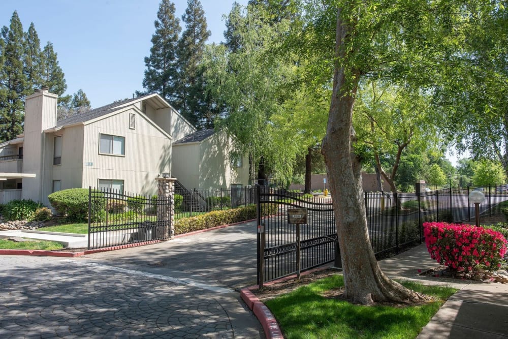 Entrance gates at Huntcliffe Apartments in Fair Oaks, California