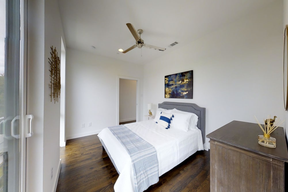 Furnished full second bedroom at The Collection Townhomes in Dallas, Texas