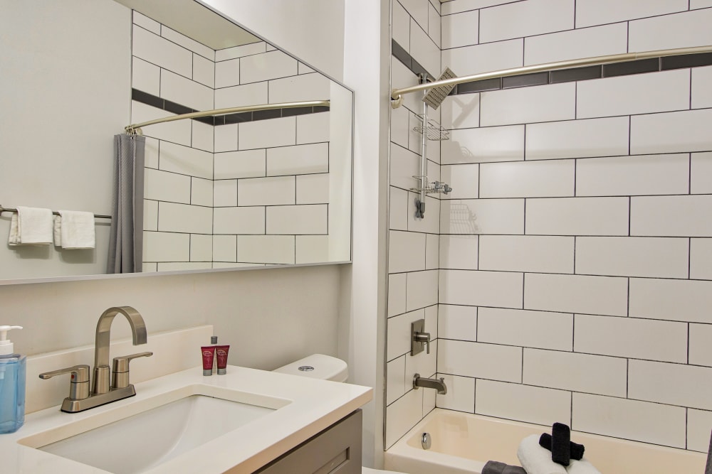 Bathroom and bathtub Steelyard Apartments in St. Louis , MO
