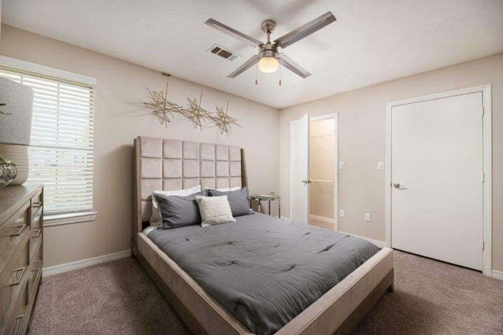 Model apartment bedroom at Midsouth 301 in Jackson, Mississippi